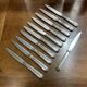 Set of 11 French Art Deco silver plated knives