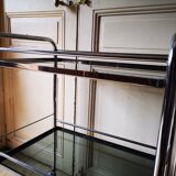 Serving in chrome and smoked glass