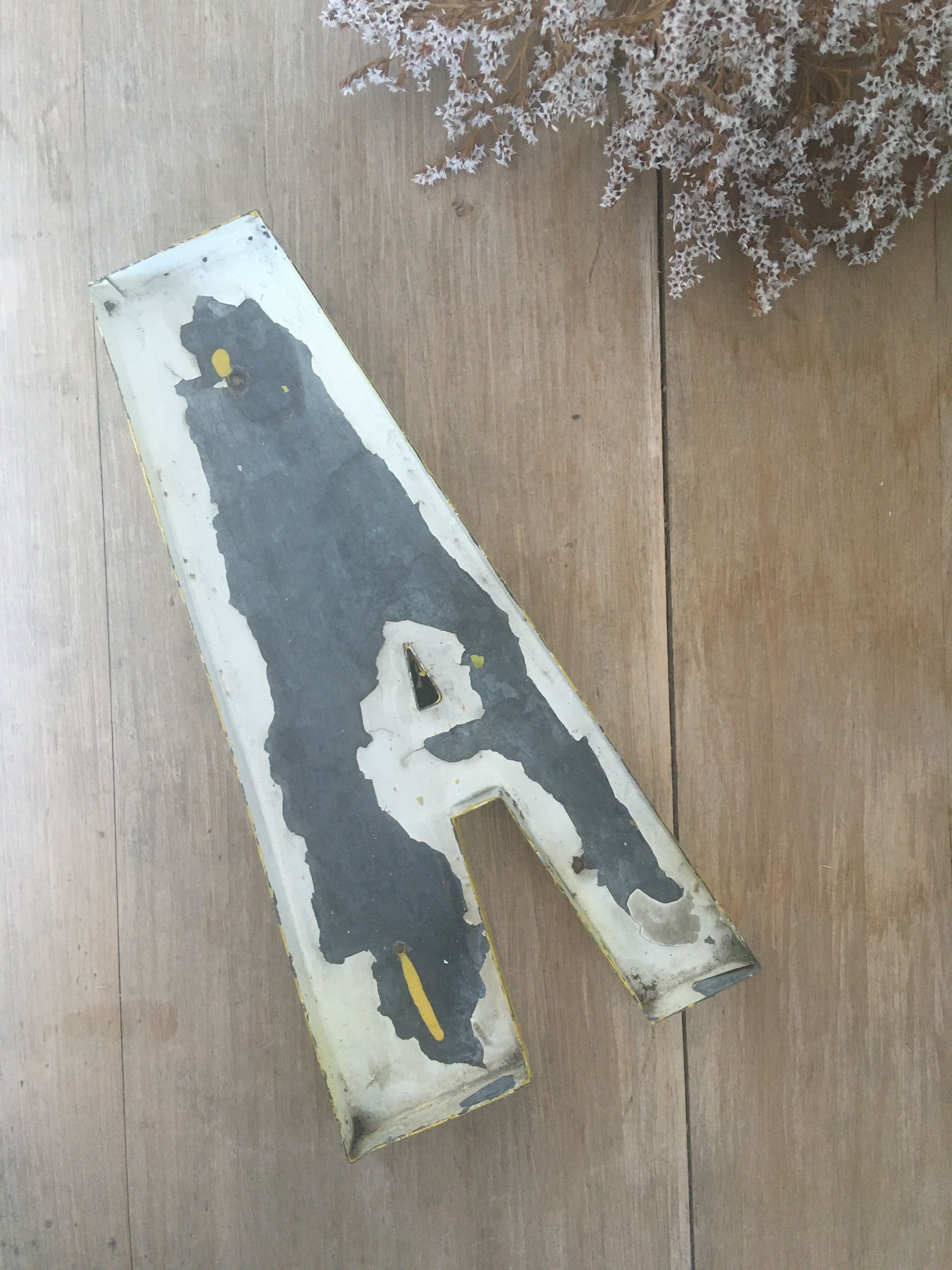 Vintage yellow sign letter A