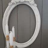 Old oval frame patinated white