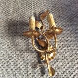 Wall lamp in gold metal