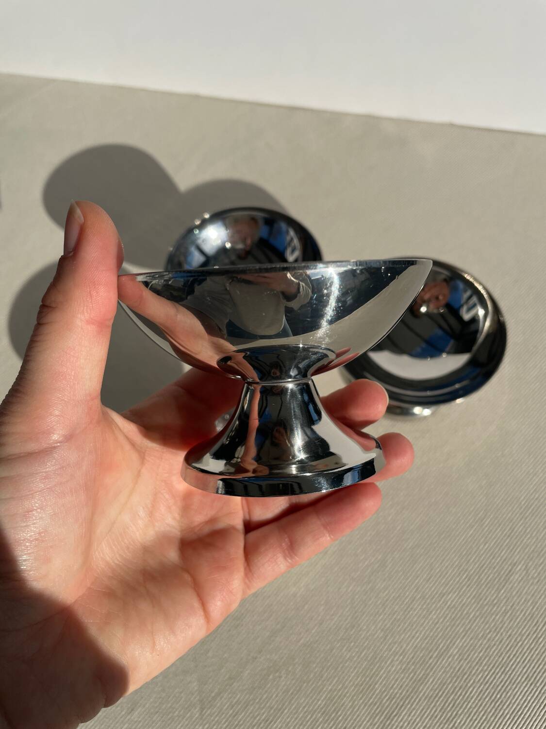 Set of 4 vintage metal ice cream glasses/cups on a stand.