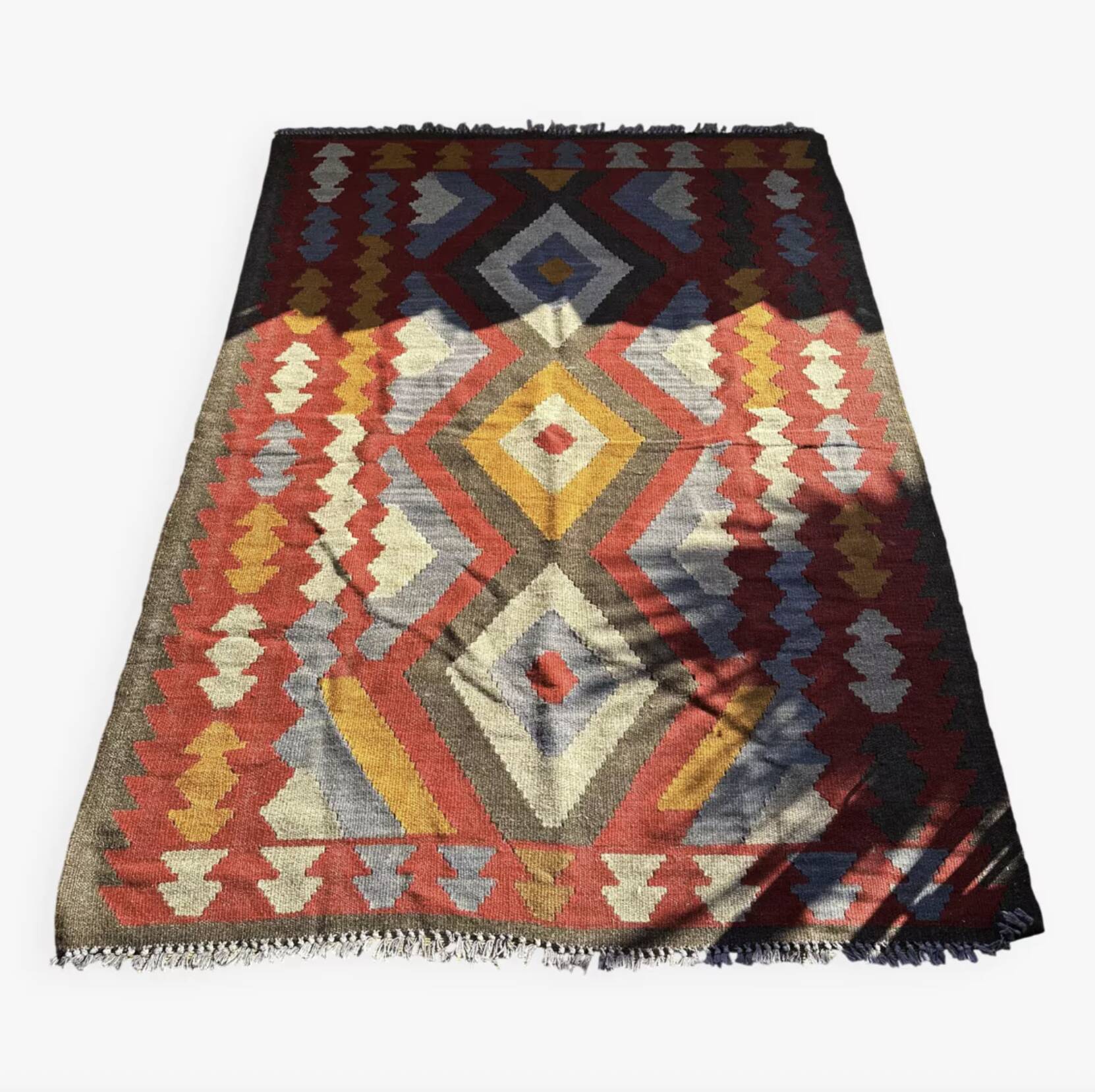 Multicoloured handmade wool kilim rug. Turkey, 1970s.