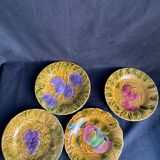Set of four old Sarreguemines barbotine plates