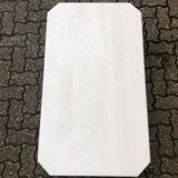 Light-colored travertine coffee table