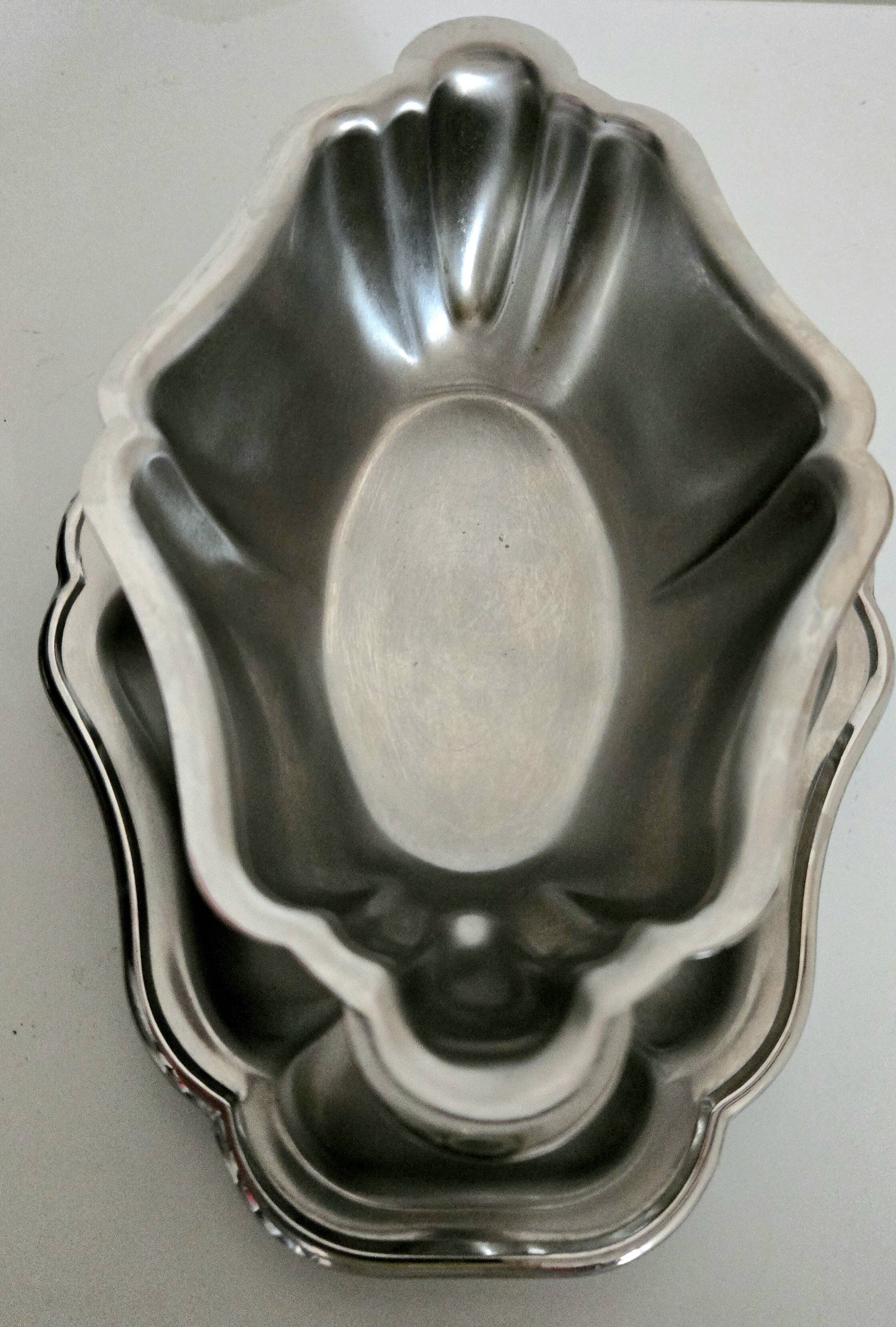 Patinated stainless steel sauceboat