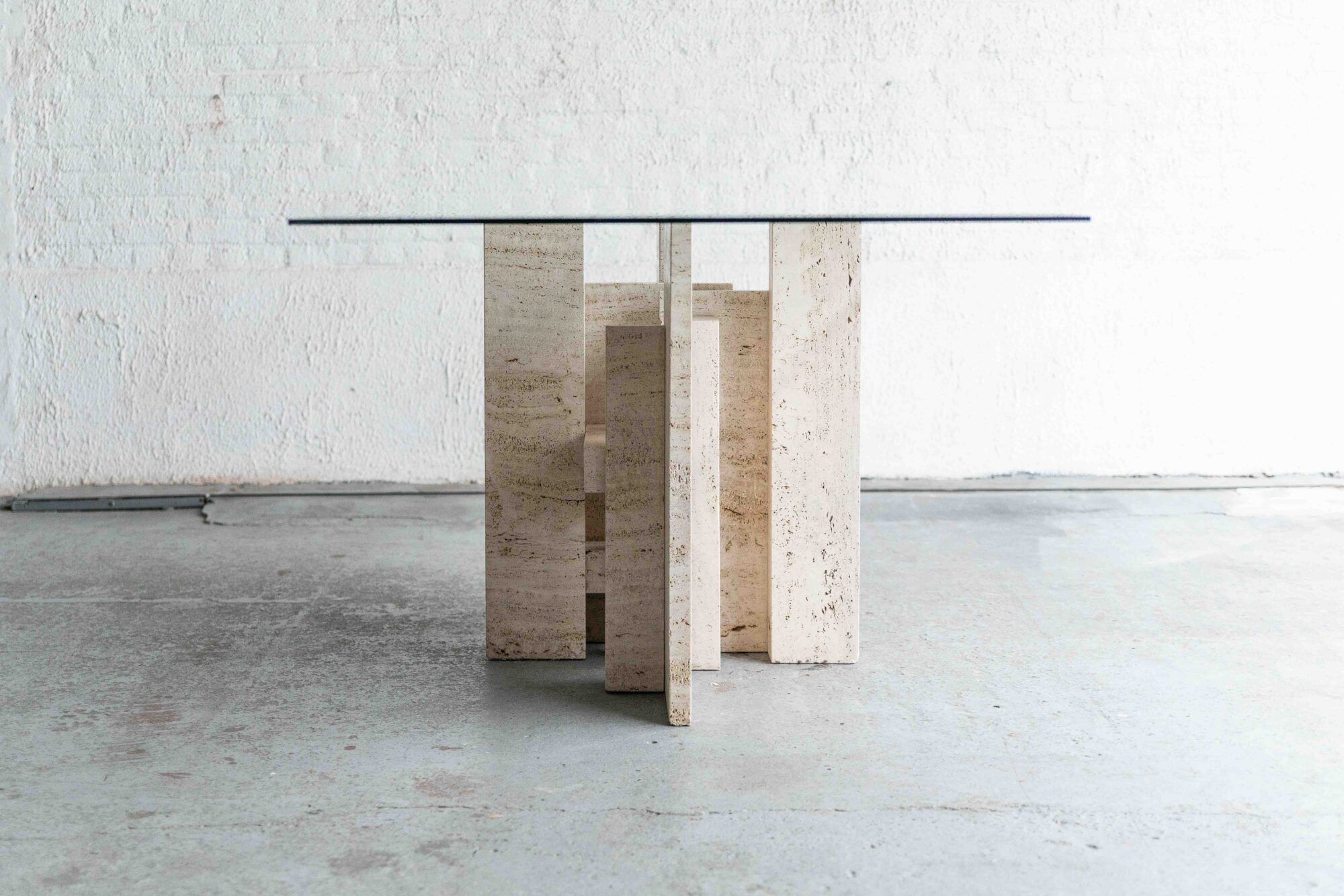 Glass & travertine dining table by Willy Ballez