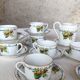 10 tea cups and creamer in Limoges porcelain