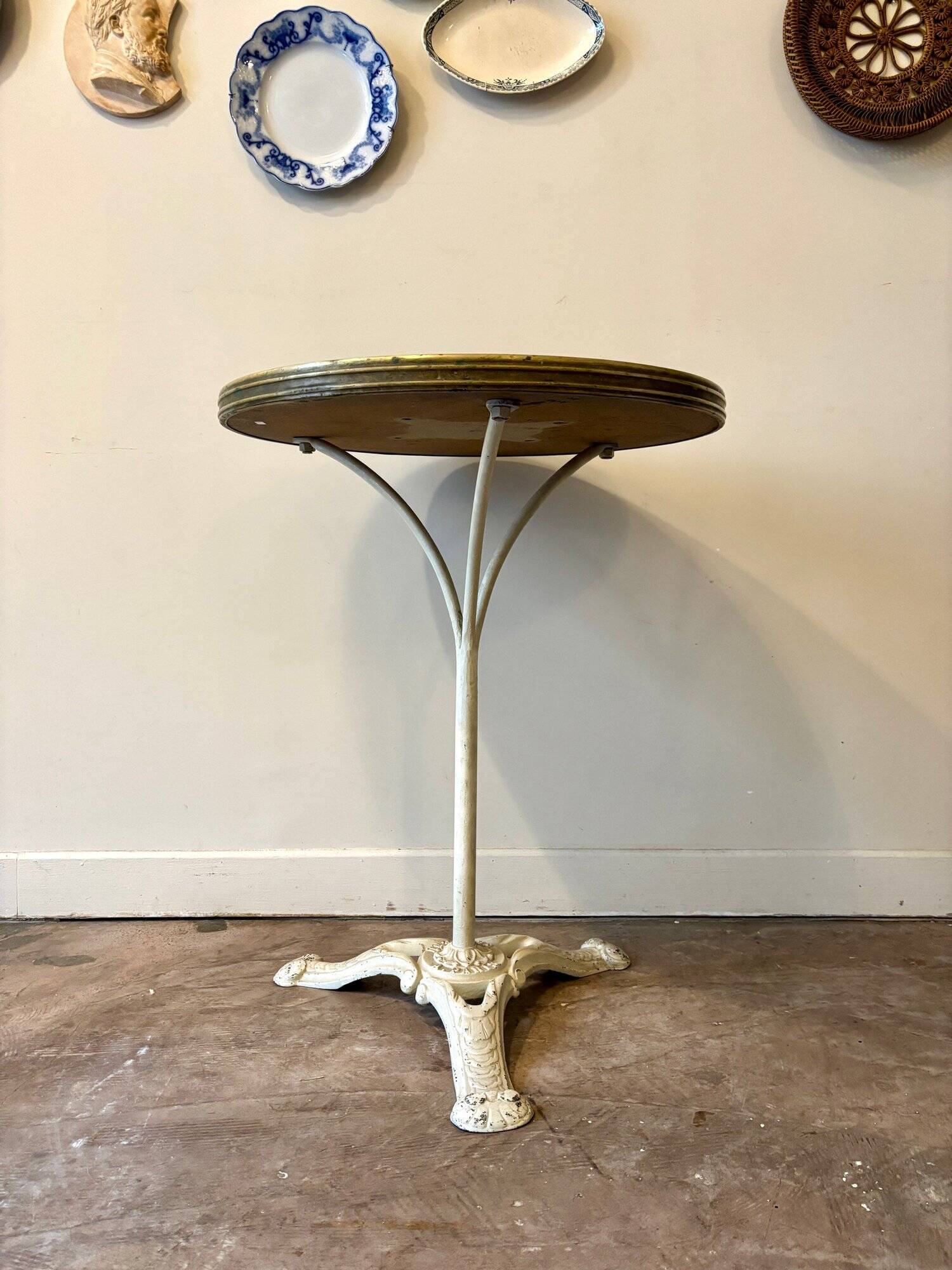 Bistro table in gray cast iron and brown melamine