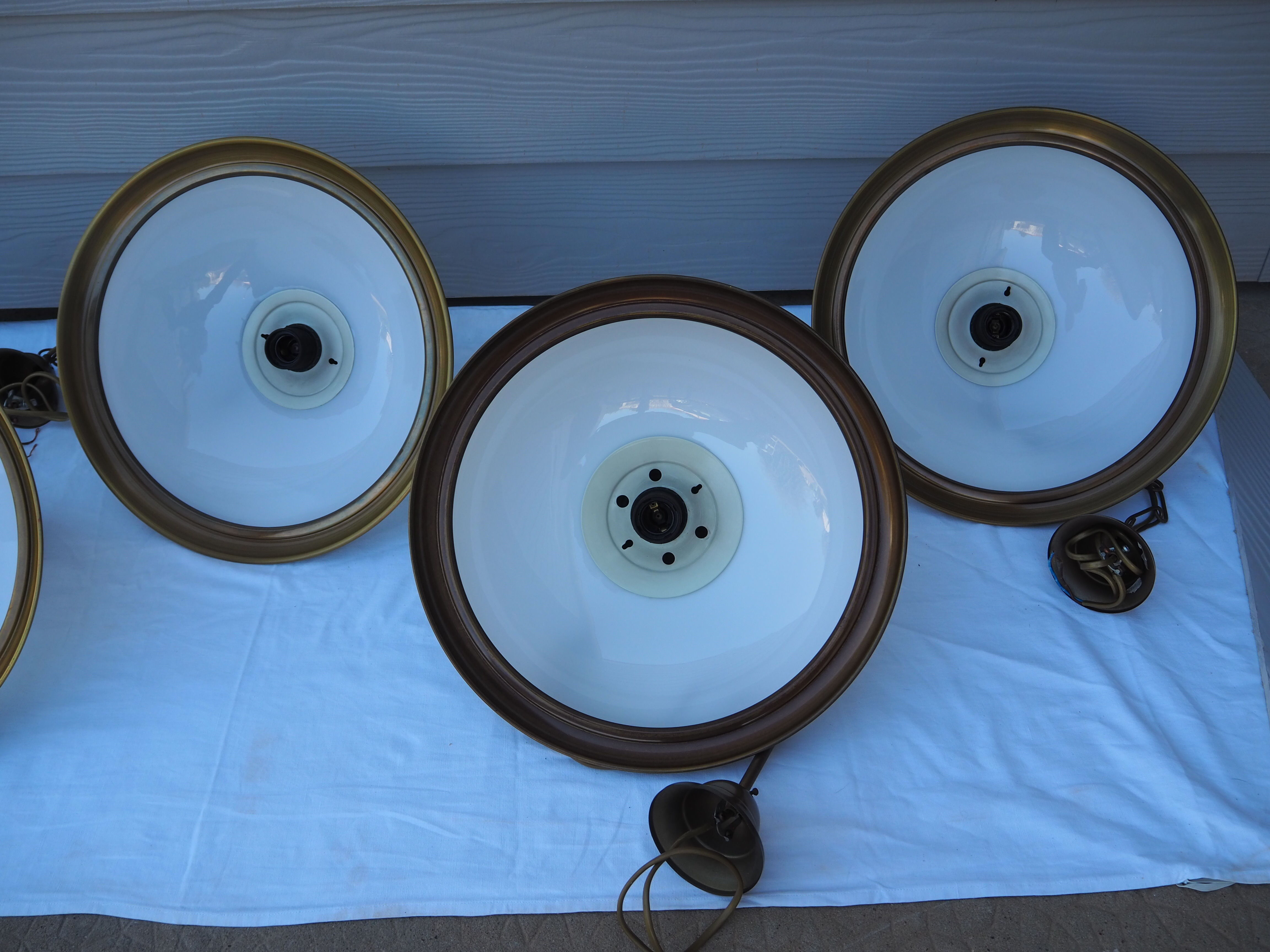 Suspension in white opaline, its edge in aged brass