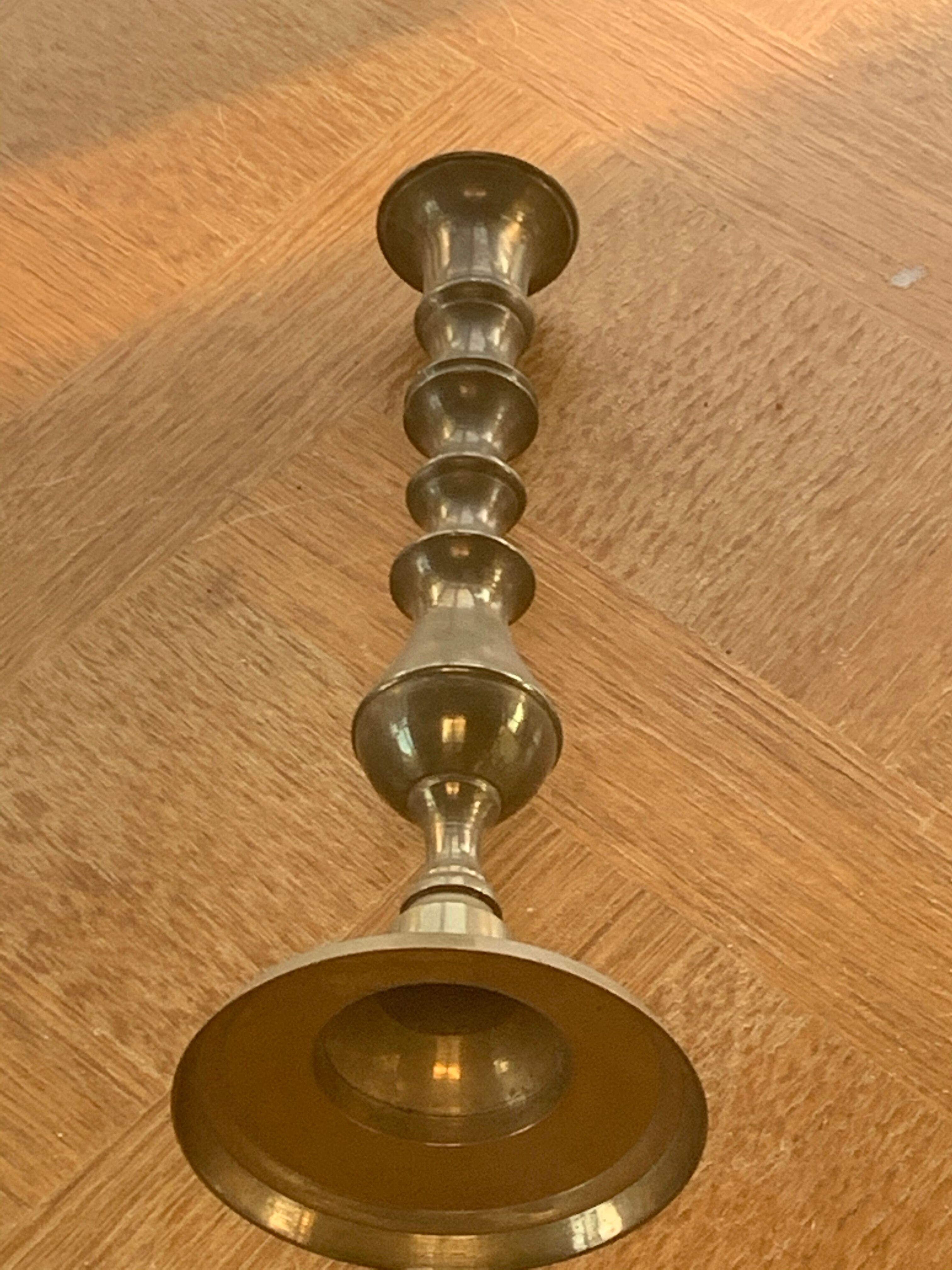 Brass candlestick, gold metal turns and chiseled original and vintage