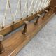 Vintage wooden wall coat rack with 6 hooks, chalet style.