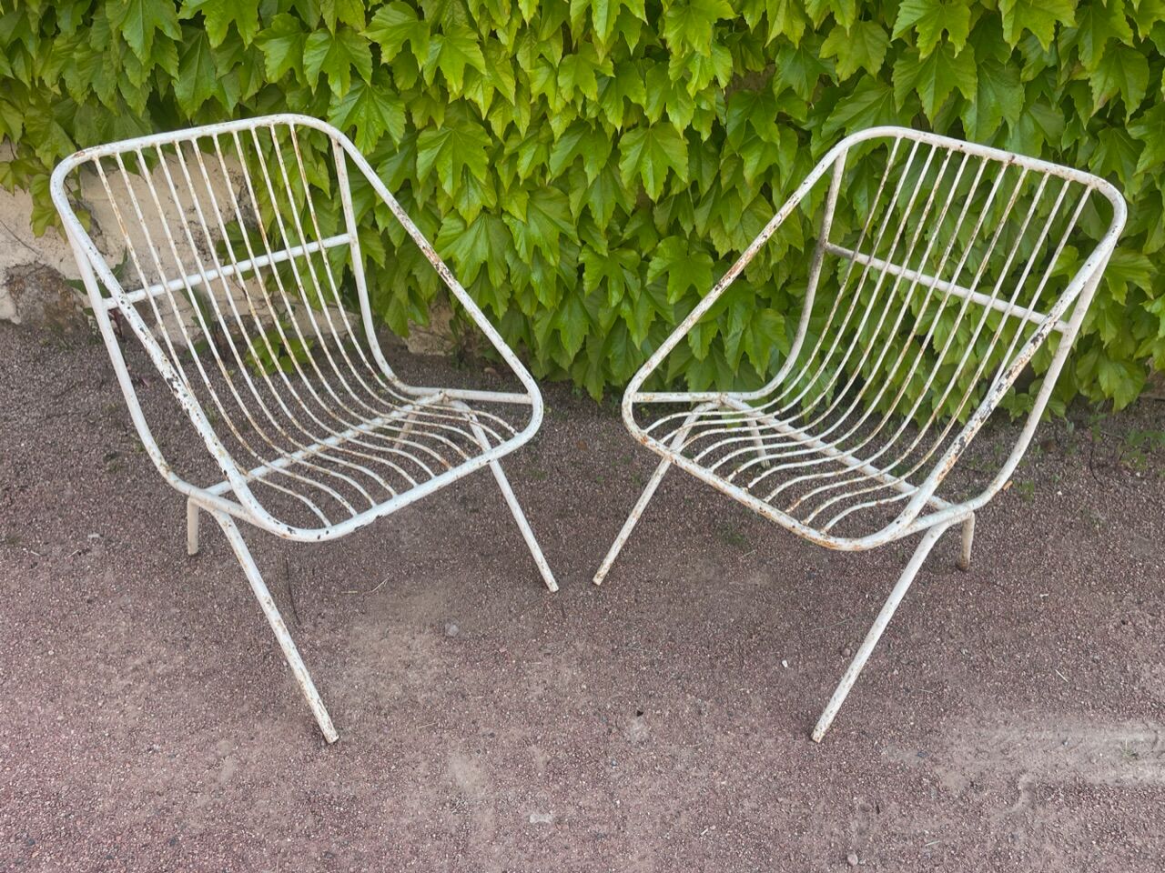 Pair of wrought iron armchairs year 60