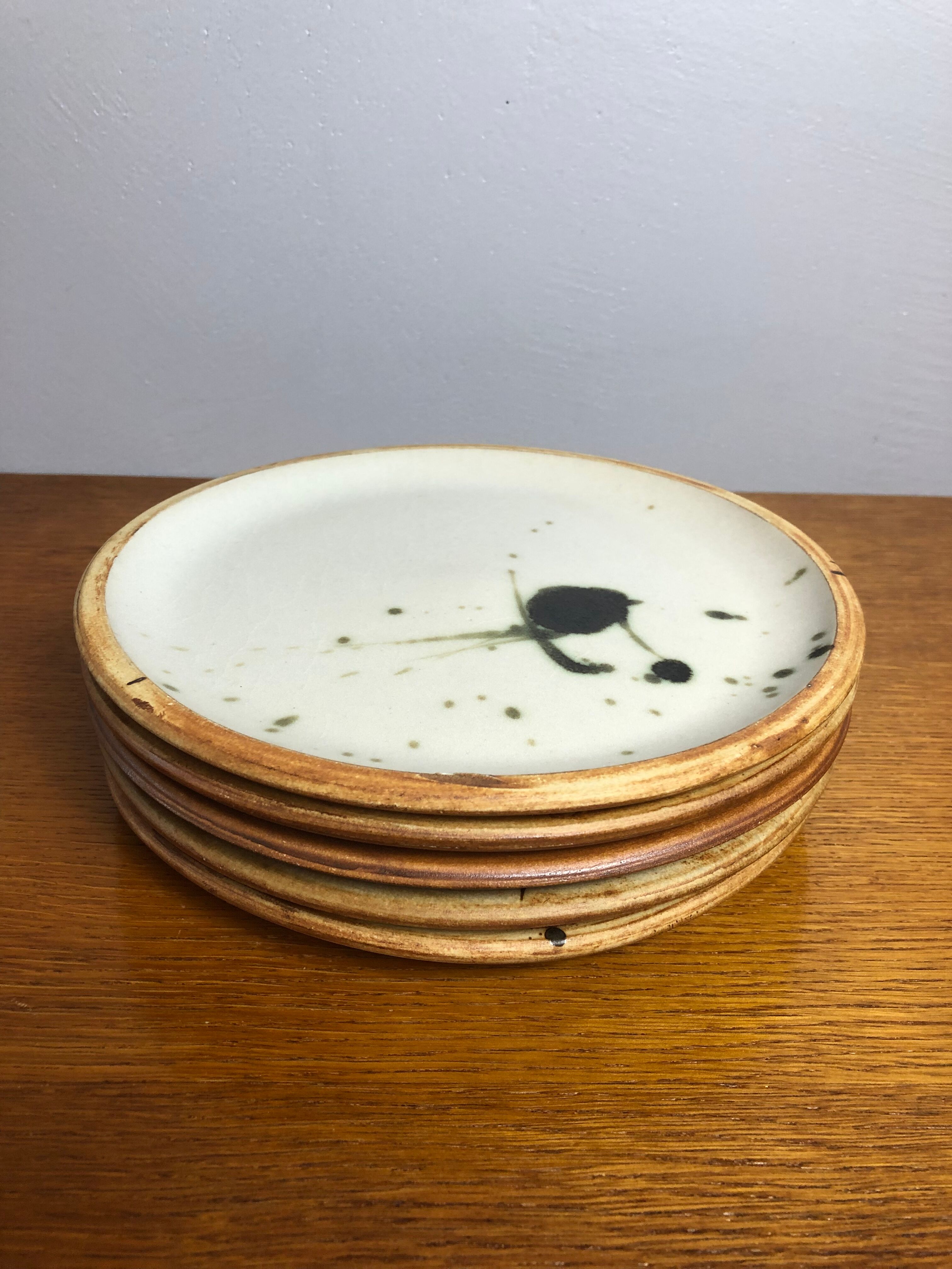 5 flat ceramic plates, La Colombe pottery