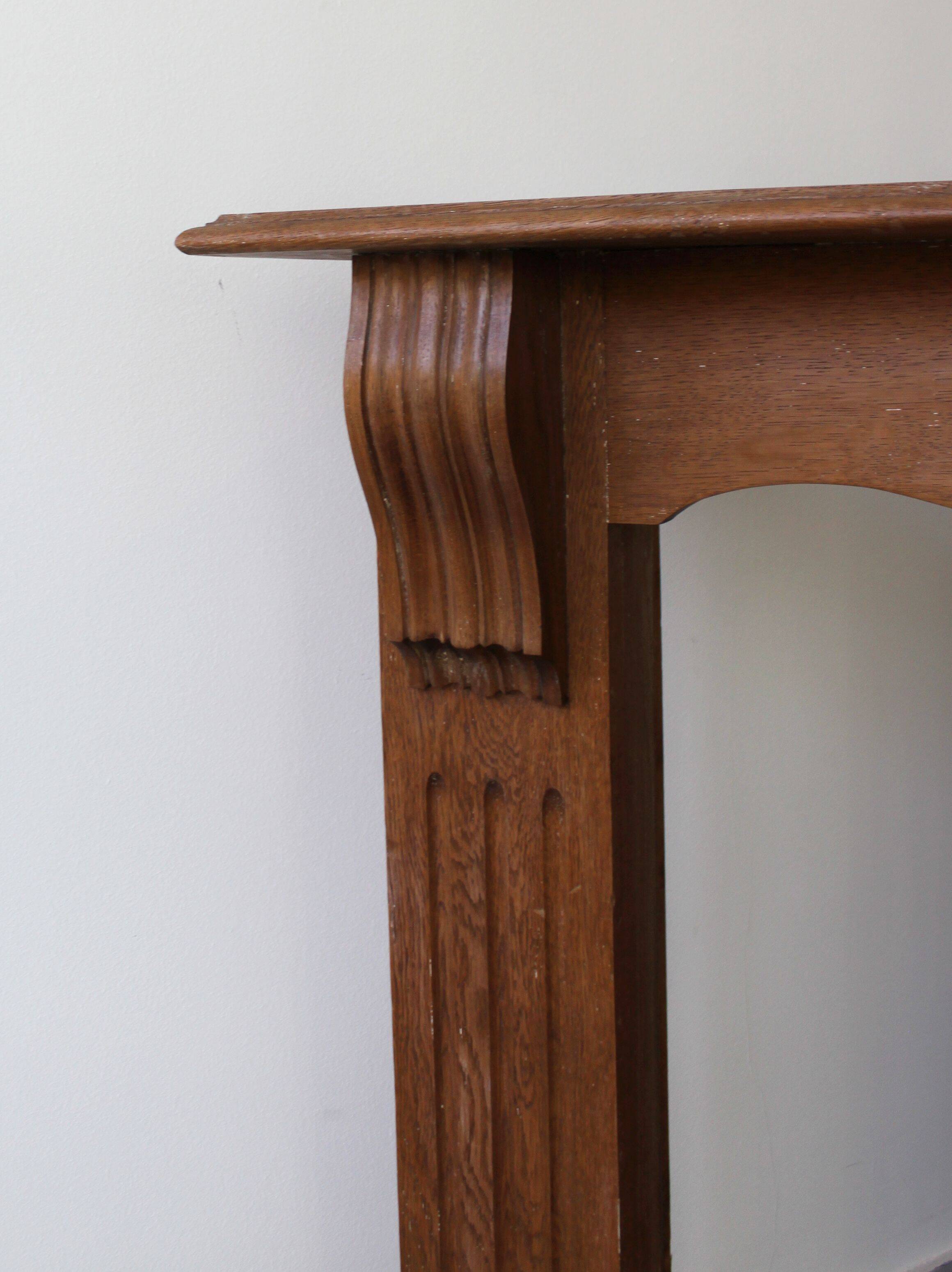 Oak fireplace mantel, Empire style.