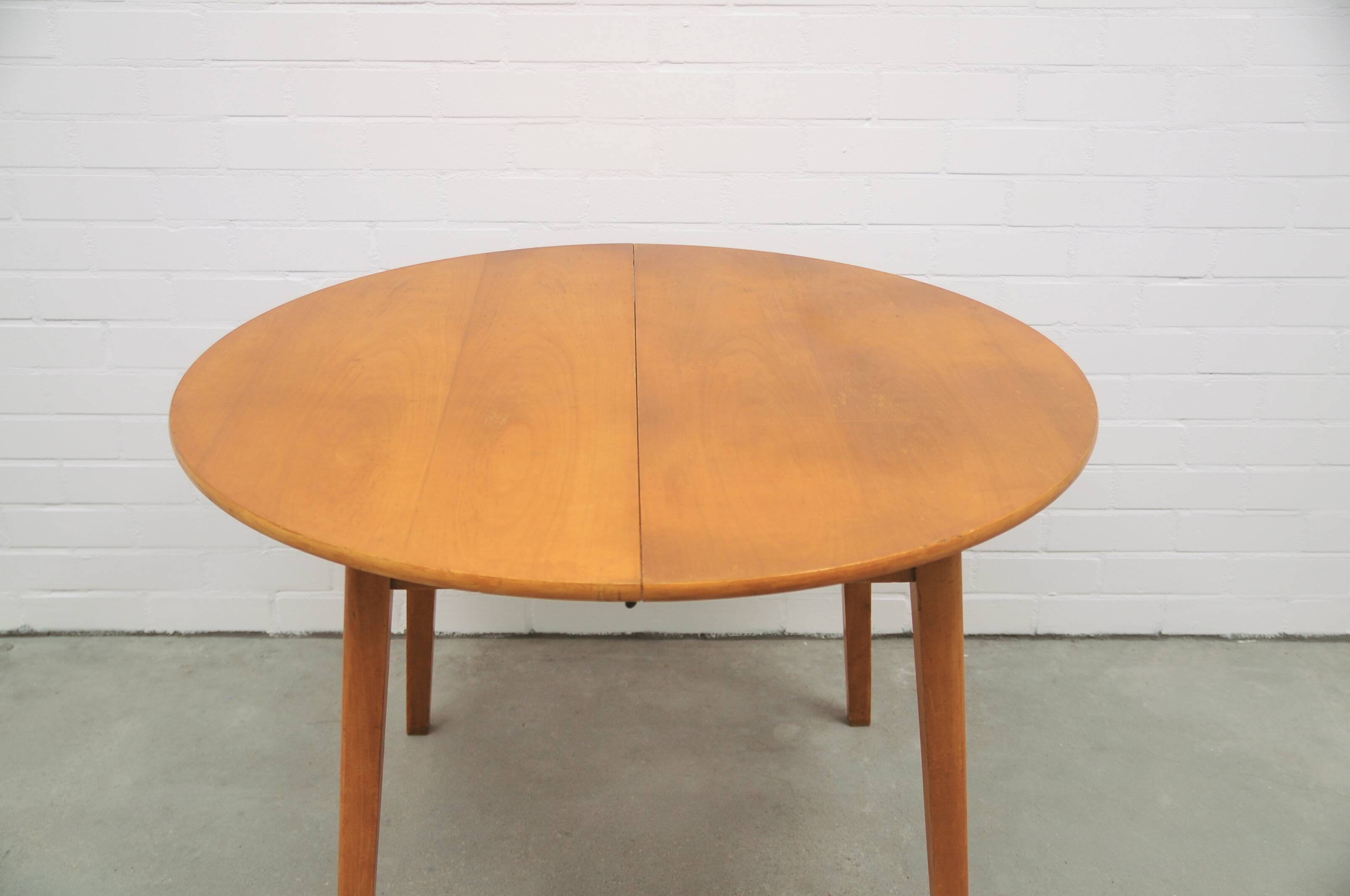 vintage round fold-out dining table