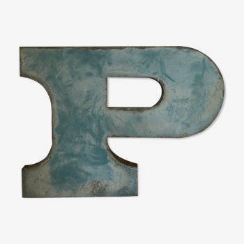 Blue sign letter "P"