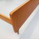 Double bed in vintage Scandinavian style from the 1960s with bedside tables.