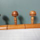 Bamboo-like wall coat rack with 5 mushroom hooks
