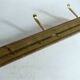 Wall mounted wooden coat rack with 3 brass hooks, vintage from the 50s