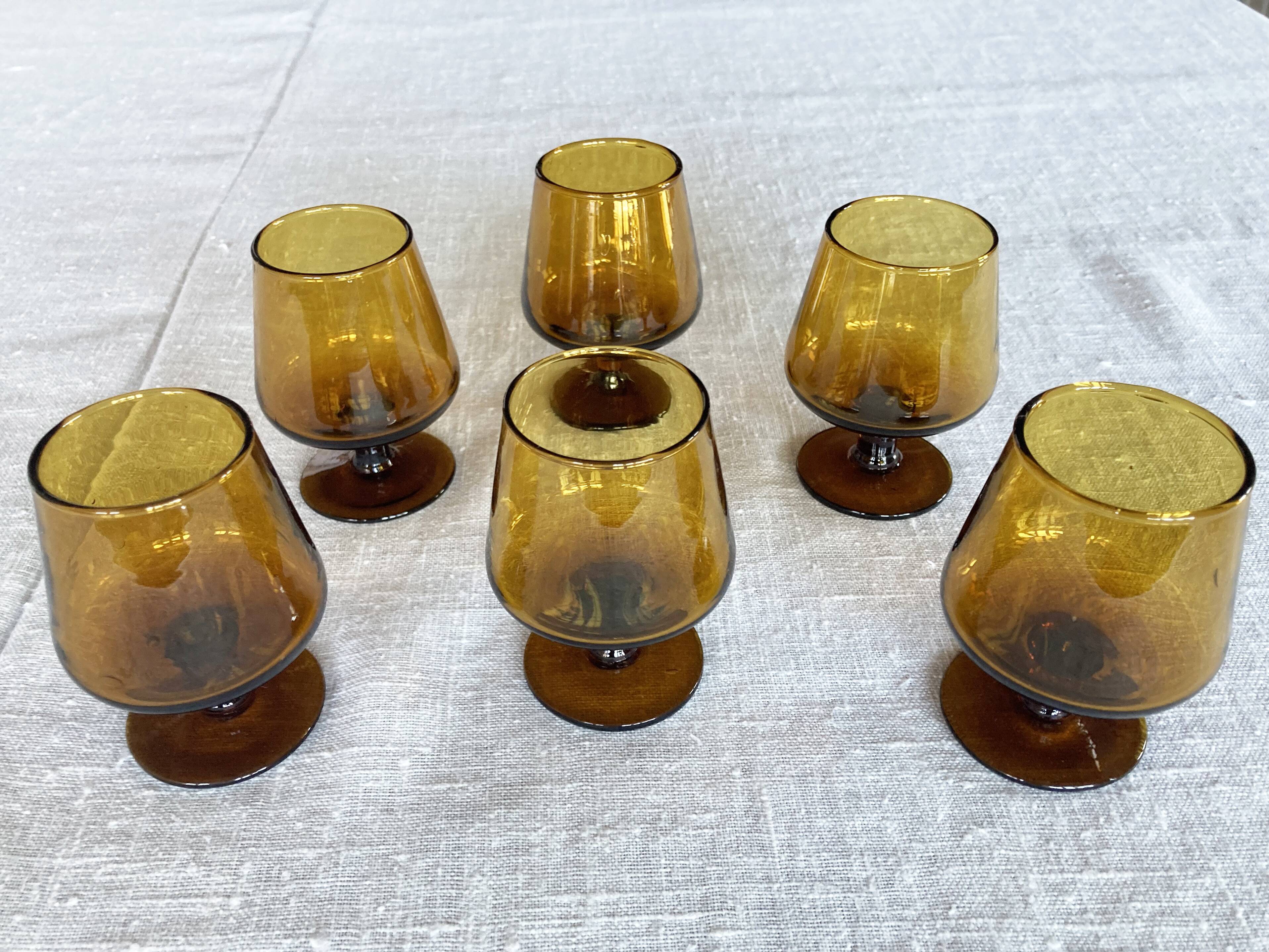 6 small amber glass stemmed glasses