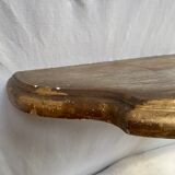 Wooden wall console and antique gilded stucco