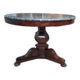 Pedestal table with gray depression marble