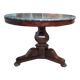 Pedestal table with gray depression marble
