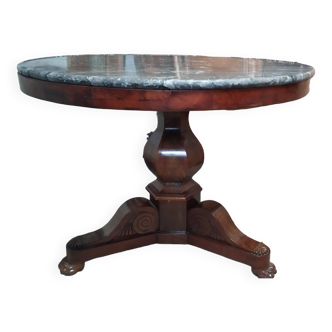 Pedestal table with gray depression marble