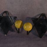 Pair of vintage black wrought iron and yellow wood coat hooks 1950