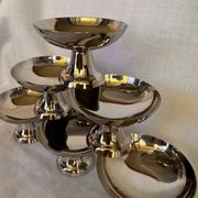 Set of 6 stainless steel ice cream bowls by Guy Degrenne with matching spoons.