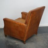 Fauteuil club cognac, années 1940
