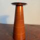 Pair of Guy Degrenne wooden and stainless steel candlesticks
