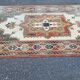 Large oriental wool rug with terracotta geometric patterns 200x300cm