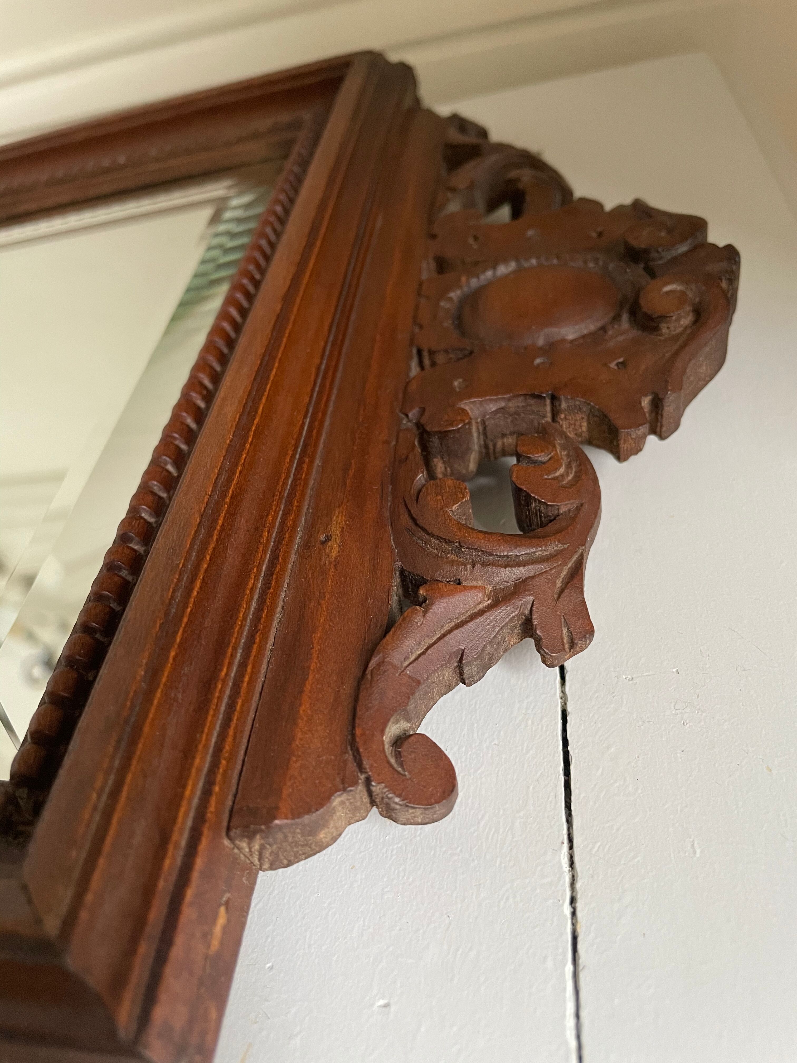 Bevelled mirror frame carved wood