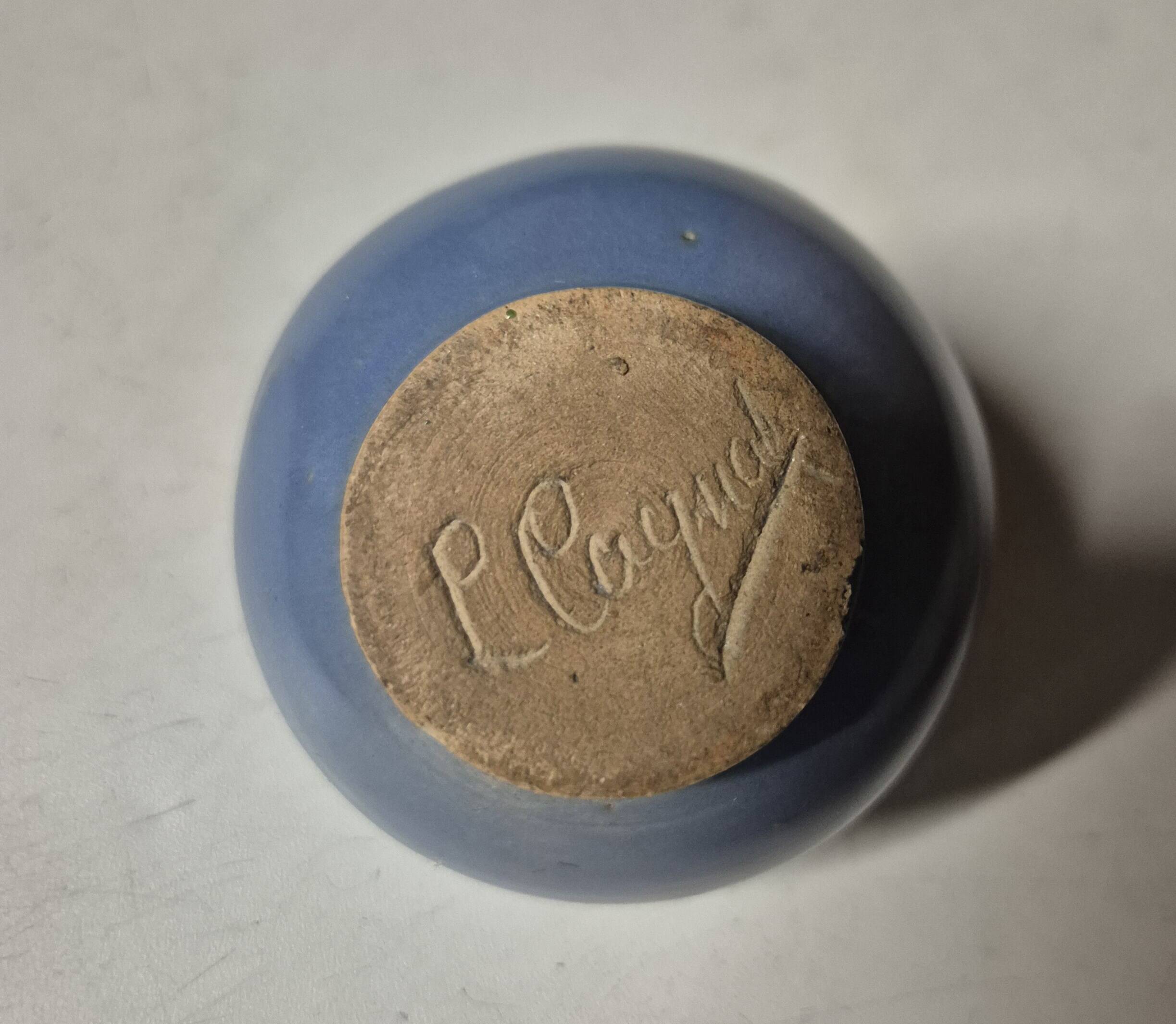 Glazed ceramic flower spike vase stamped "to be defined"