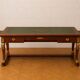 Empire-style centre desk in mahogany – with side pull-outs