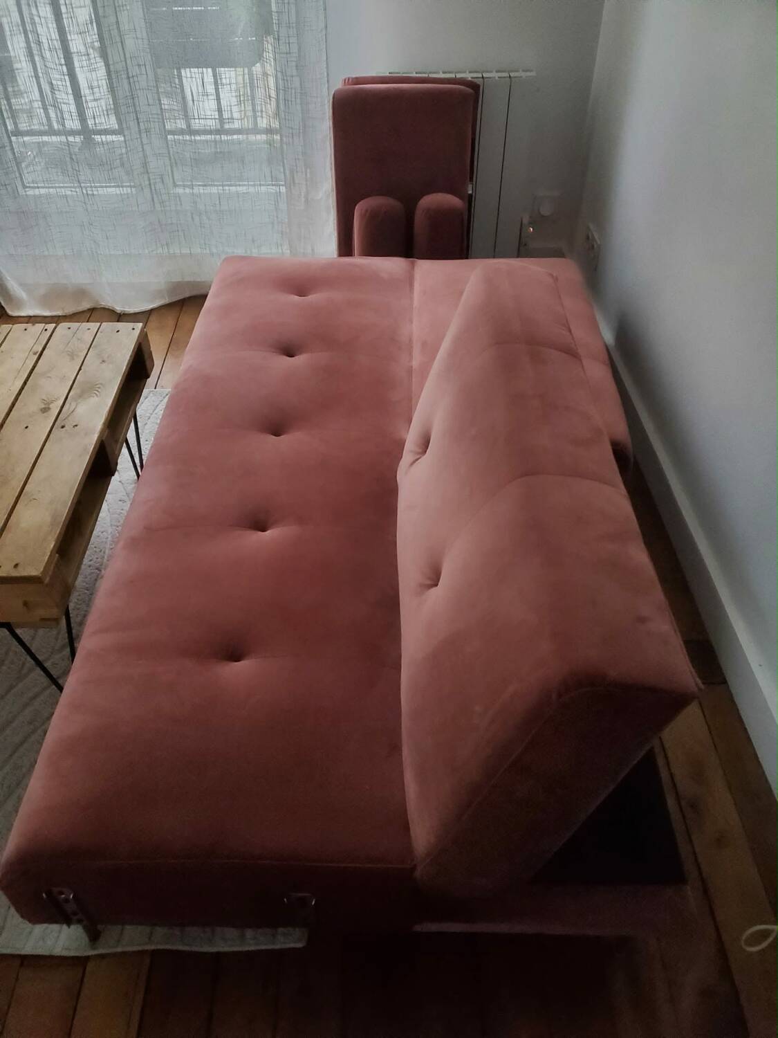 Powder pink convertible sofa