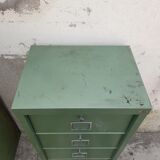 Iron clamshell cabinet