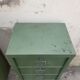 Iron clamshell cabinet
