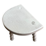 Small tripod stool in gray wood