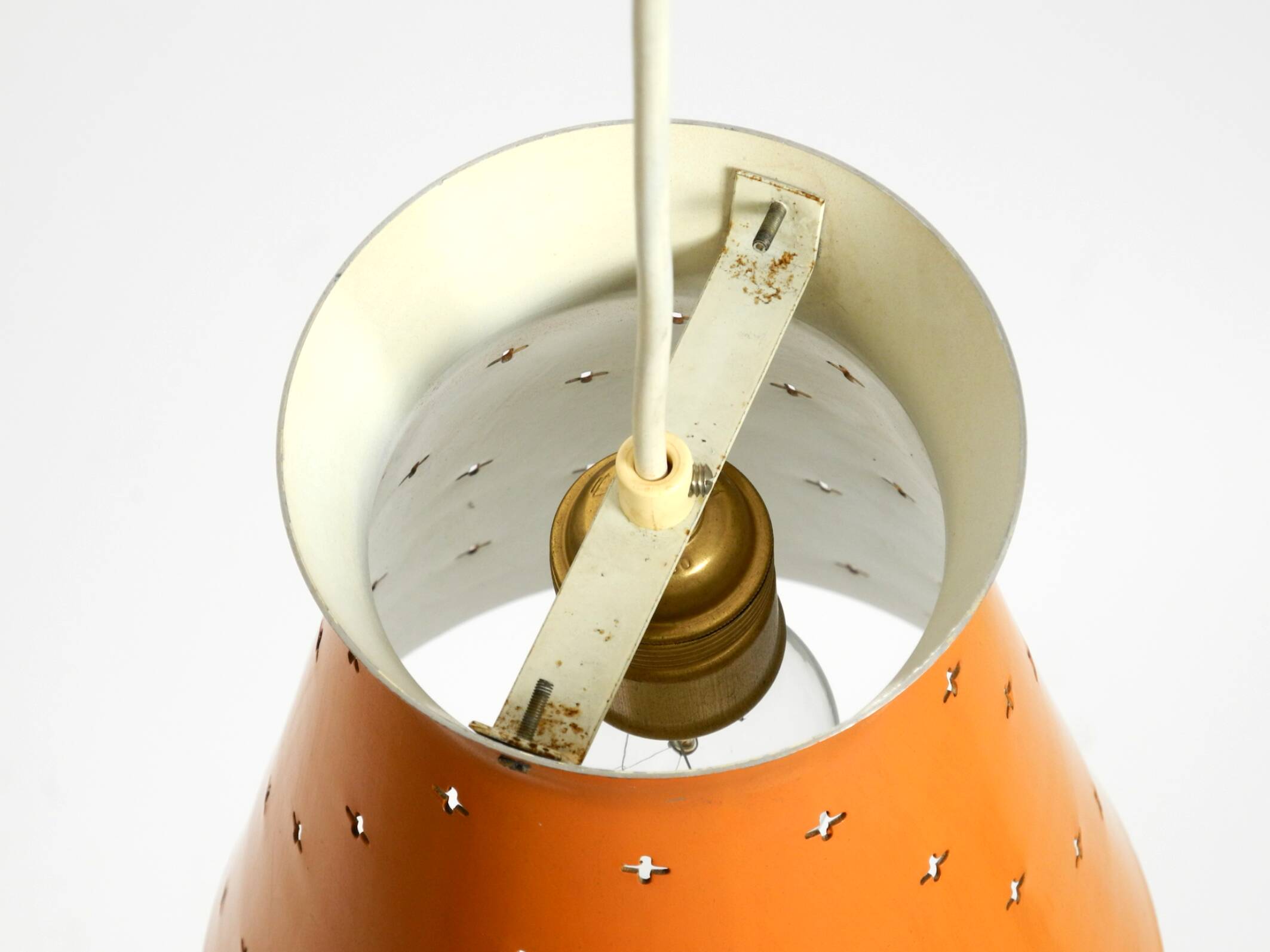 Beautiful Mid Century Modern Diabolo perforated metal sheet pendant lamp