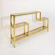 Vintage shelves in brass and smoked glass.