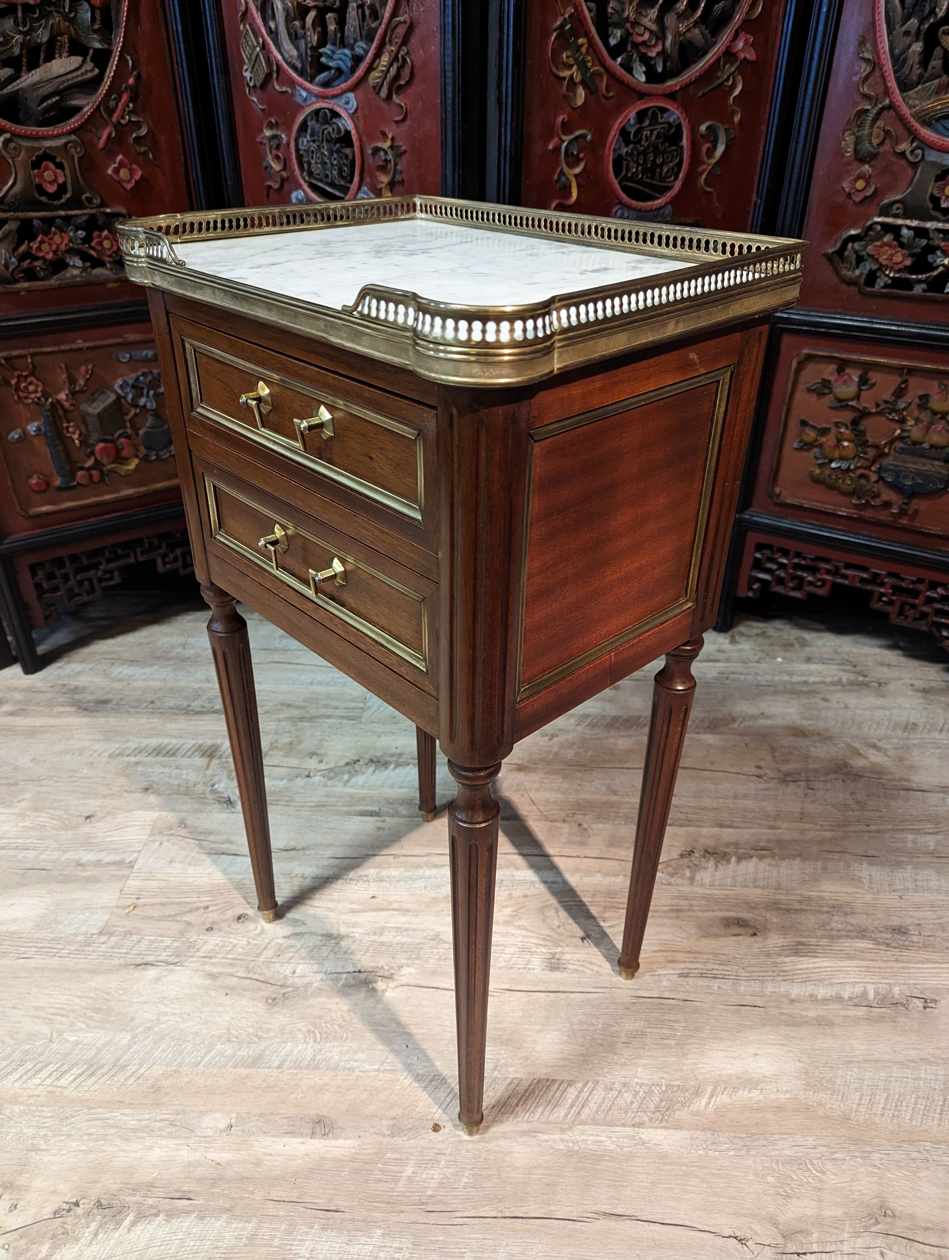 Pair of Louis XVI style bedside tables in mahogany