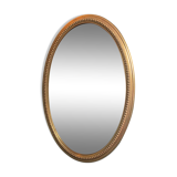 Vintage beveled gold oval mirror
