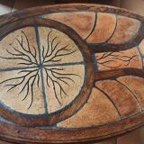 Ceramic and wood table in the shape of trees in the style of capron style