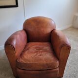 Fauteuil club en cuir patiné