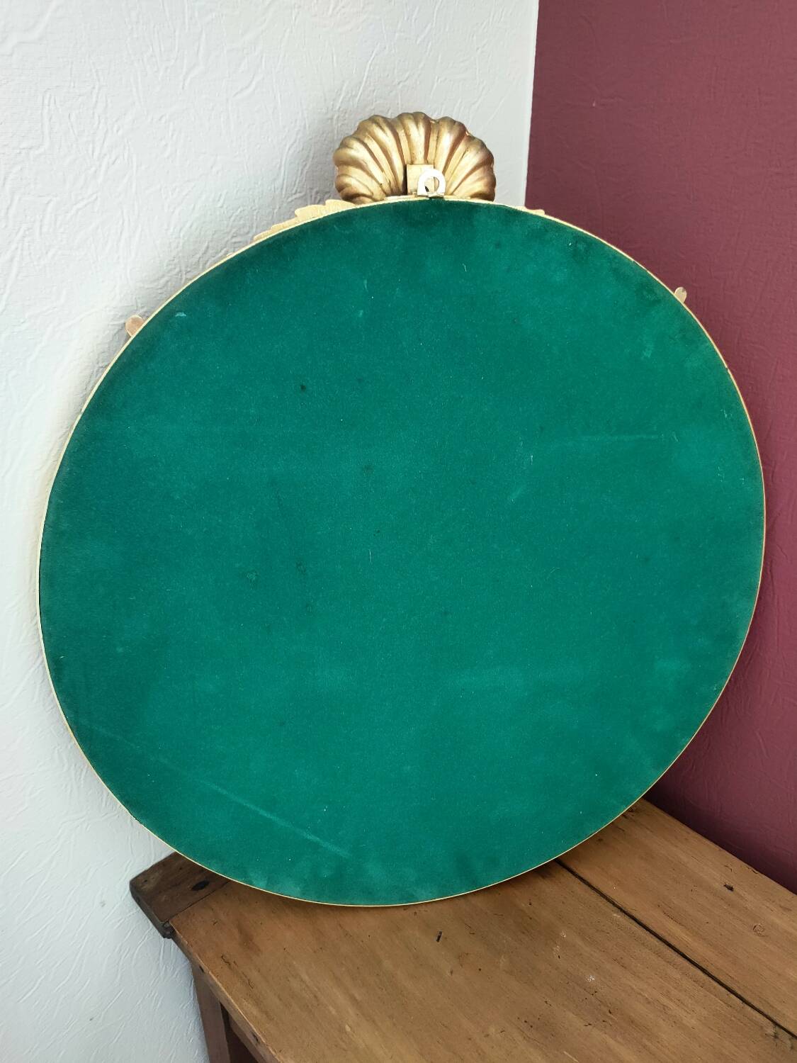 Large round gold metal mirror