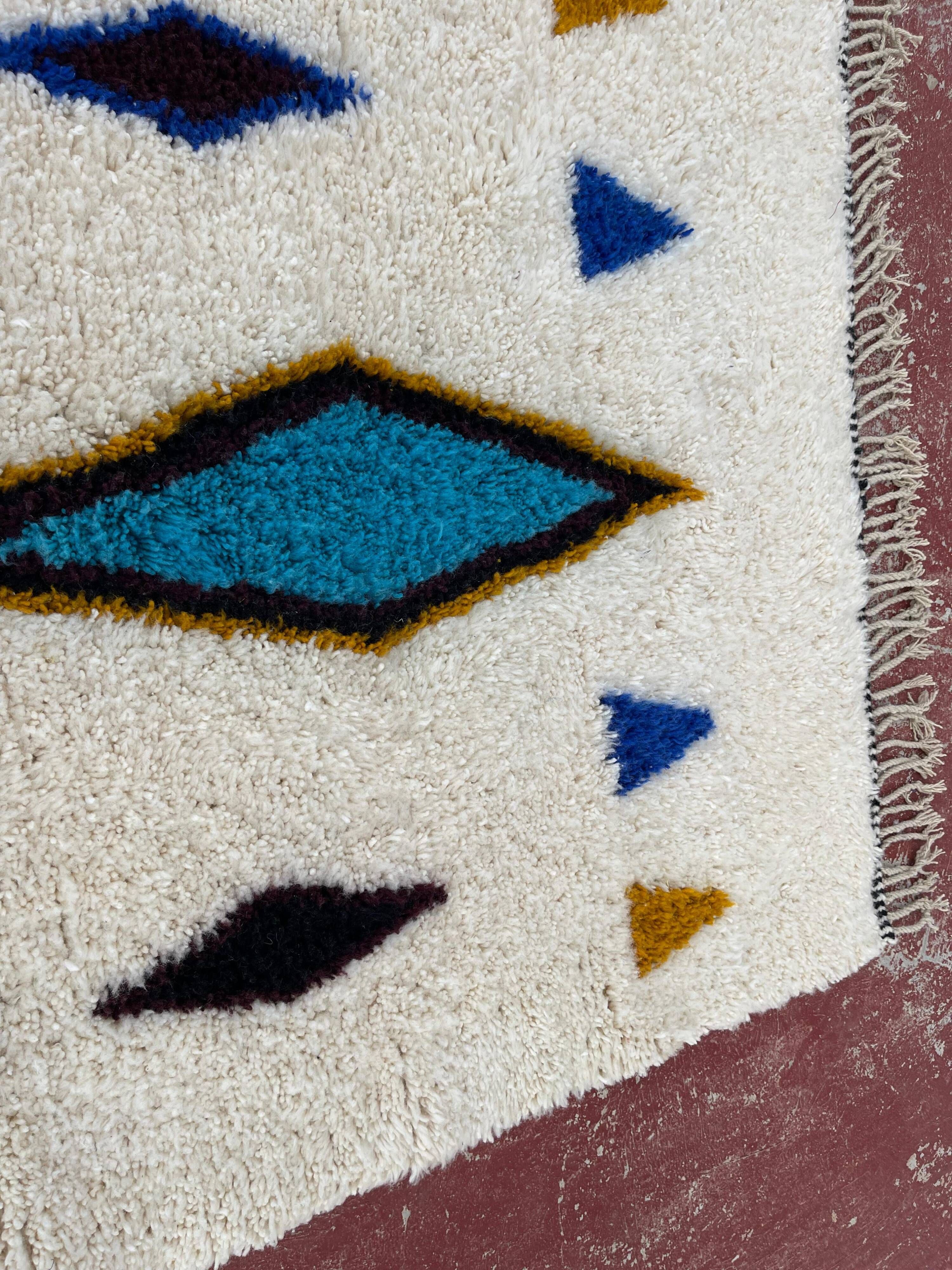 Moroccan Berber rug in cream and blue 250x150 cm – colourful geometric patterns
