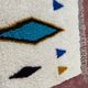 Moroccan Berber rug in cream and blue 250x150 cm – colourful geometric patterns